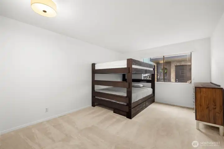 Versatile second bedroom —perfect for guests, work, or play.