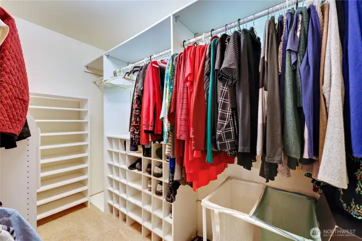 The spacious walk-in closet off the primary bedroom.