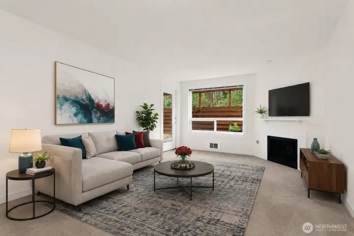 Virtually staged living room and back door to yard. Virtually staged living room and back door to yard.