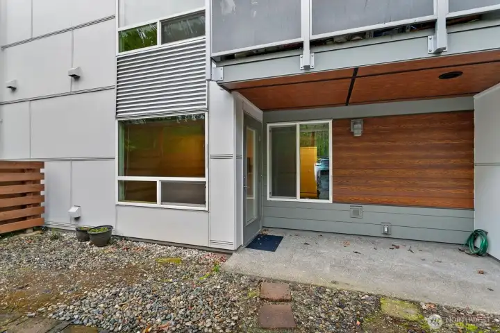 From backyard to patio! Lots of room for outdoor furniture. From backyard to patio! Lots of room for outdoor furniture.