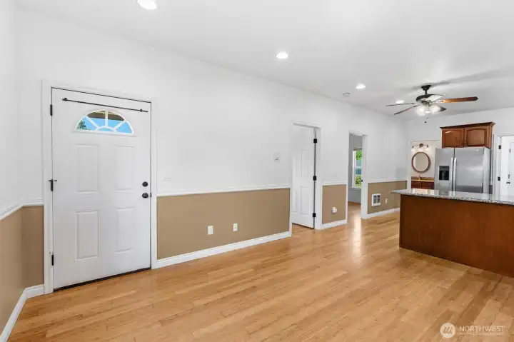 Nice living/dining room with loads of natural light and beautiful bamboo floor.
