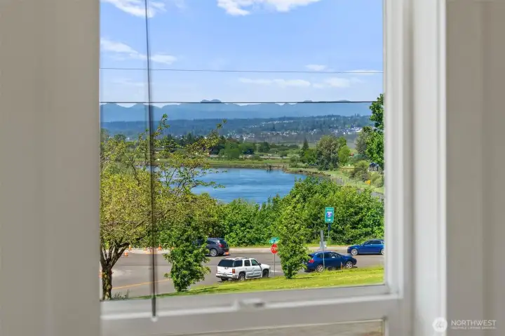 Views of the Cascade Mountains and Snohomish River from the primary bedroom.
