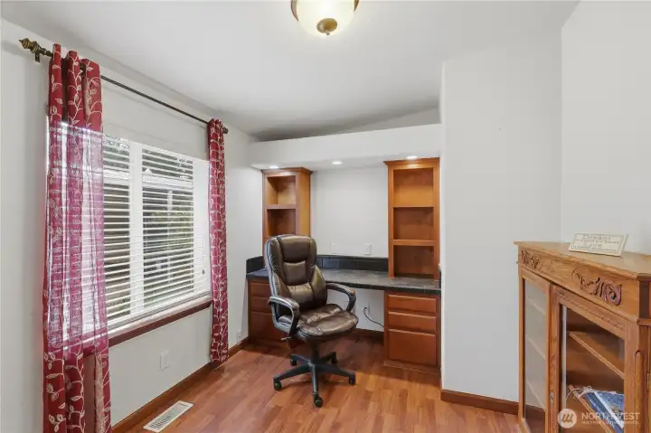 Den/office with built in desk.