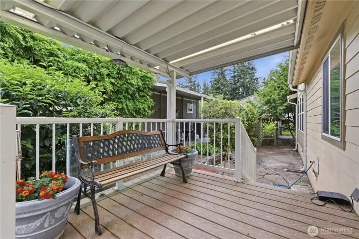 In addition to huge front deck this home also has a spacious on the west side of the home.