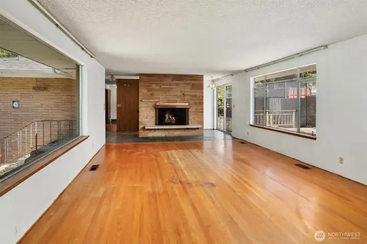 Living Room with Hardwood Floors and Wood Burning Fireplace