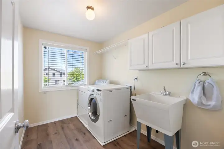 Downstairs Laundry room off of Primary Bedroom