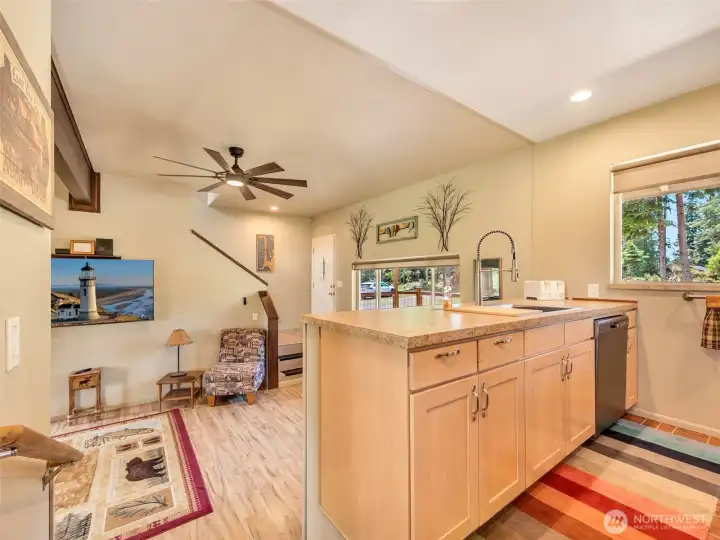 Vaulted great room designed for comfortable everyday living and entertaining. Vaulted great room designed for comfortable everyday living and entertaining.