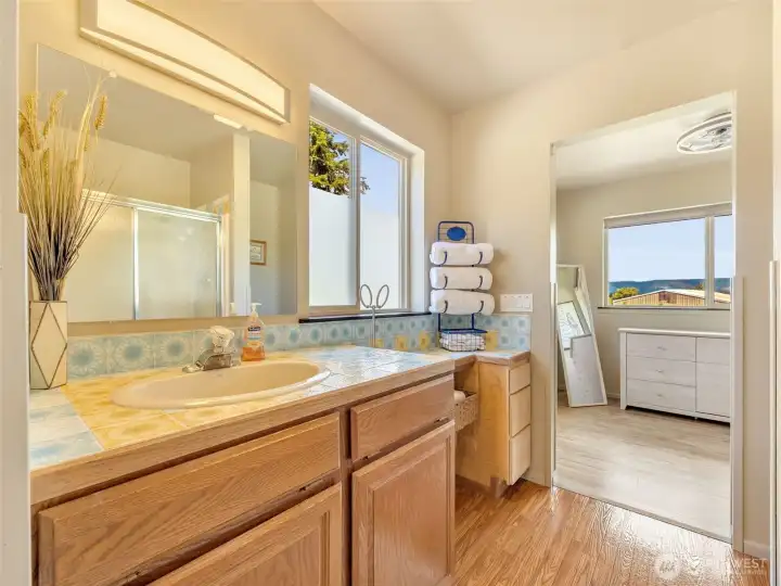 Primary bathroom with dual vanities and generous counter space. Primary bathroom with dual vanities and generous counter space.