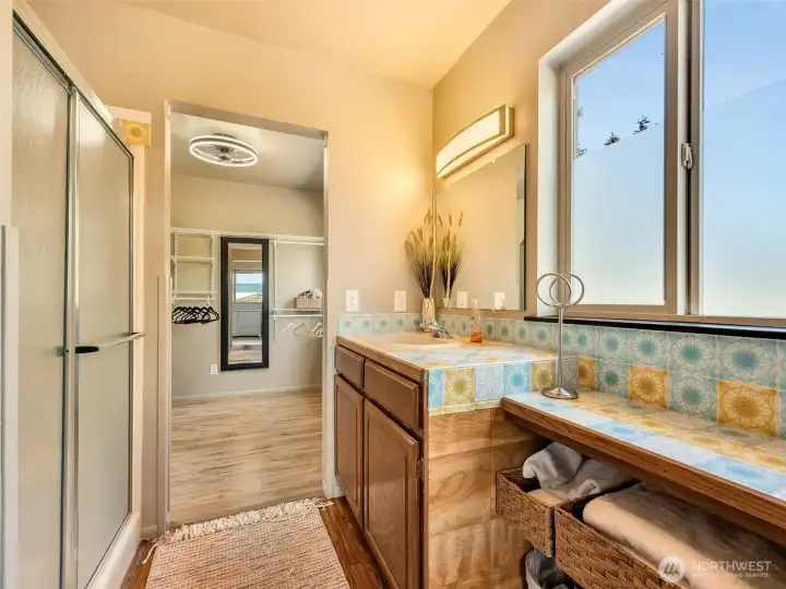 Primary bathroom with dual vanities and generous counter space. Primary bathroom with dual vanities and generous counter space.