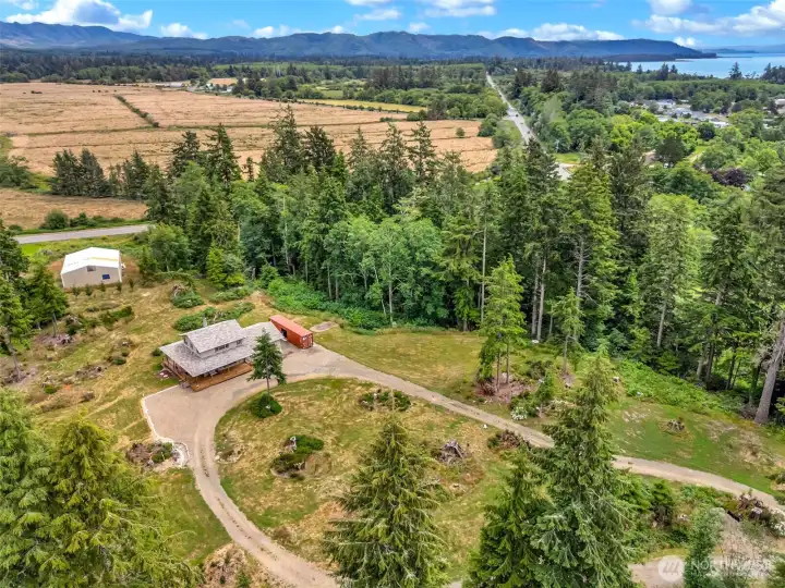 Sweeping aerial views showcase the property's peaceful setting and surrounding countryside. Sweeping aerial views showcase the property's peaceful setting and surrounding countryside.