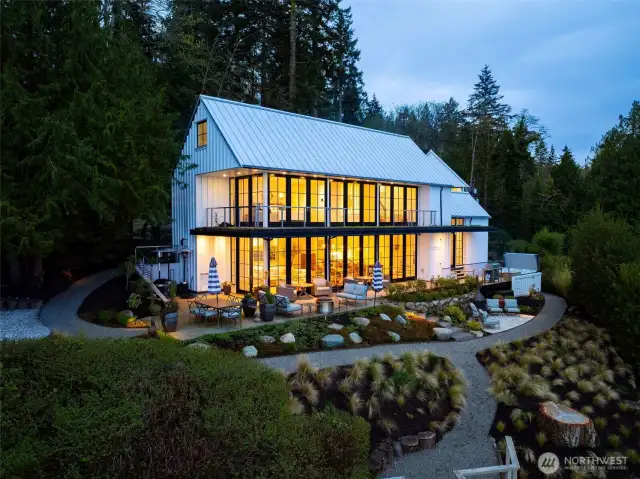 Welcome to 9844 NE Lafayette, a remarkable home set a shy half acre with 82' of pristine, private shoreline. Built in 2019.
