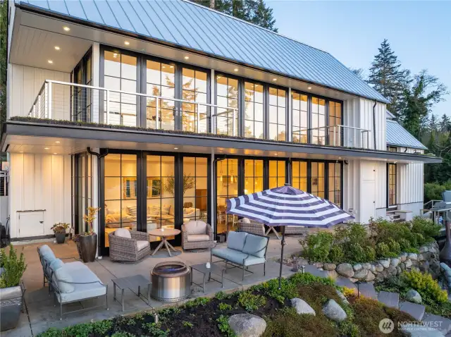 Walls of Pella Glass doors and windows allow for seamless indoor/outdoor living, a real connection with nature.