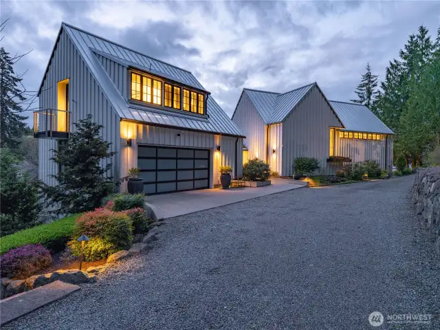 The attached 672 square foot garage has a NewAge metal cabinet system.