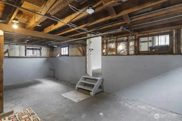Man door opens to attached garage.