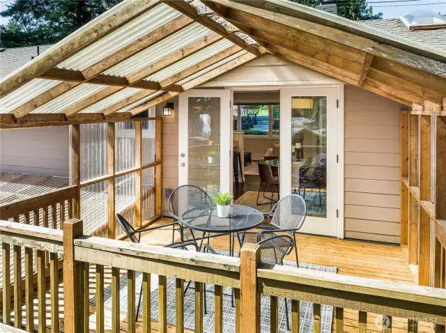 View of the covered deck looking towards the dining room.