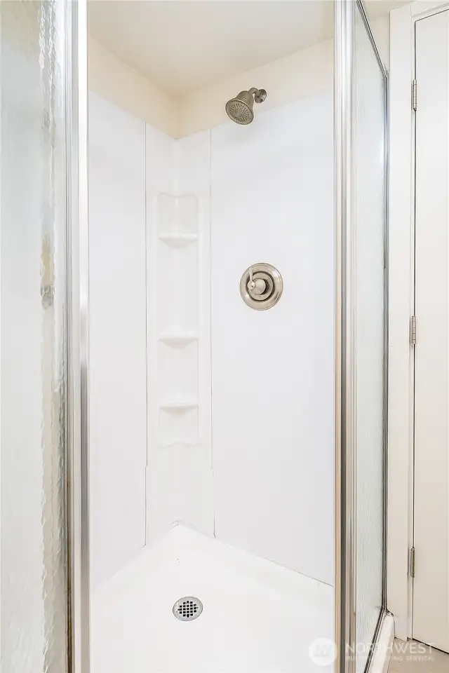Shower in downstairs bathroom.