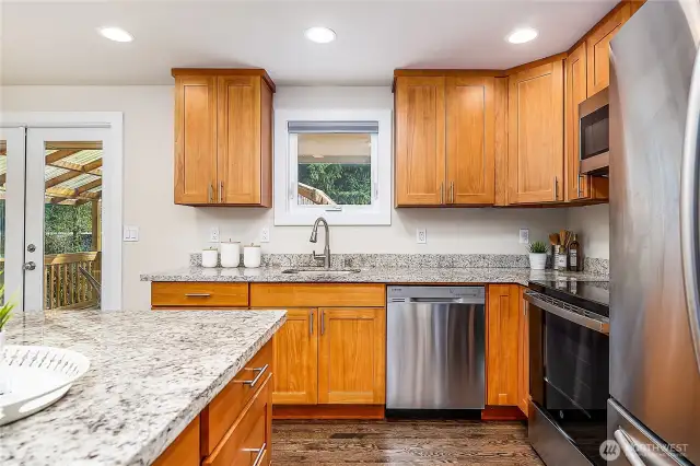 Tons of counter space and lovely views out back for cheerful dishwashing.