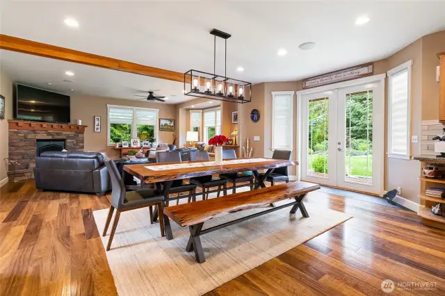 Plenty of room for a large dining table. French door lead to beautiful Tiger Wood wrap around porch.