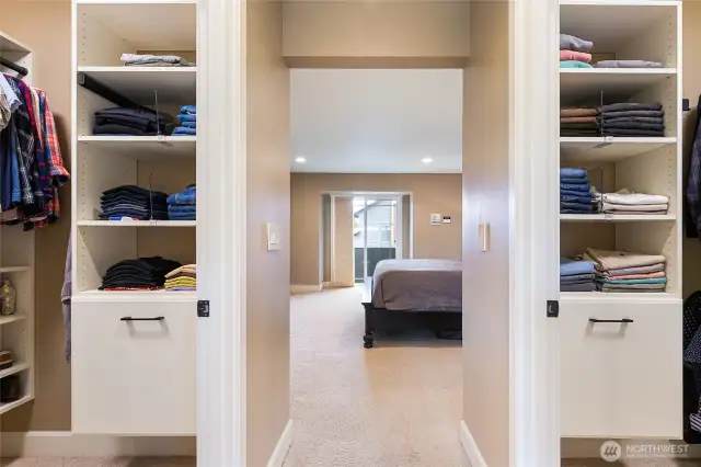 His/Her's walk-in closets flank the entry to the ensuite.