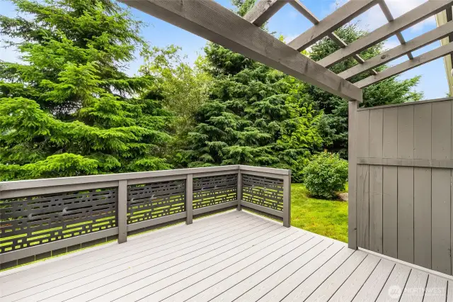 Trex deck of the very private ADU backyard