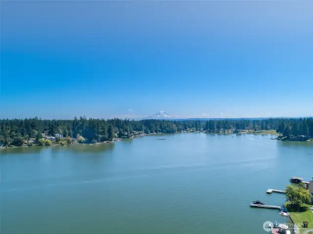 Unobstructed views of Mt.Rainier on a clear day and expansive views of the Lake, 2 major reasons why the sellers purchased this property yearsss aho.