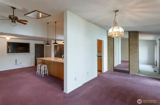 Another view of the kitchen/dining/main living layout.