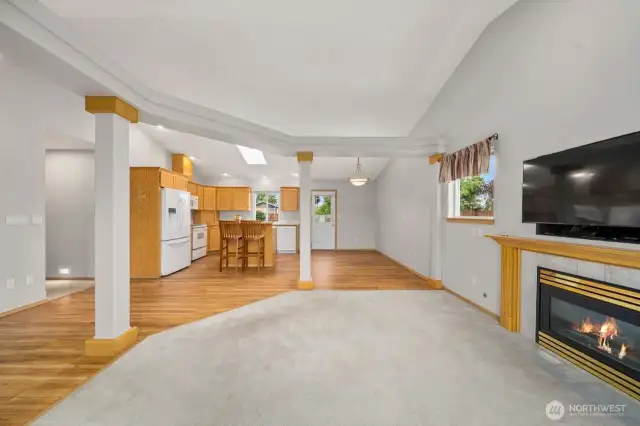 Gather around the kitchen island while still enjoying to company of people in the living room