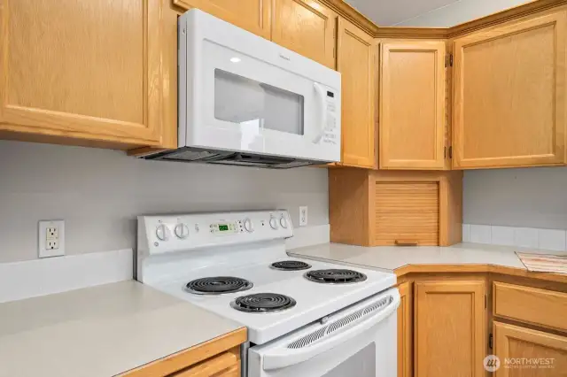 Appliance garage and lazy susan add additional storage space