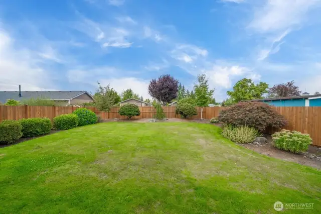 Beautiful plantings, but still room to make it your own.