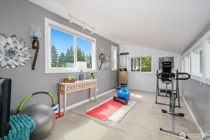 A gym, a studio or maybe even close it off to create another bedroom right at the top of the stairs.
