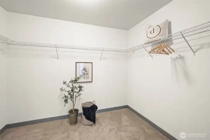Oversized primary walk-in closet