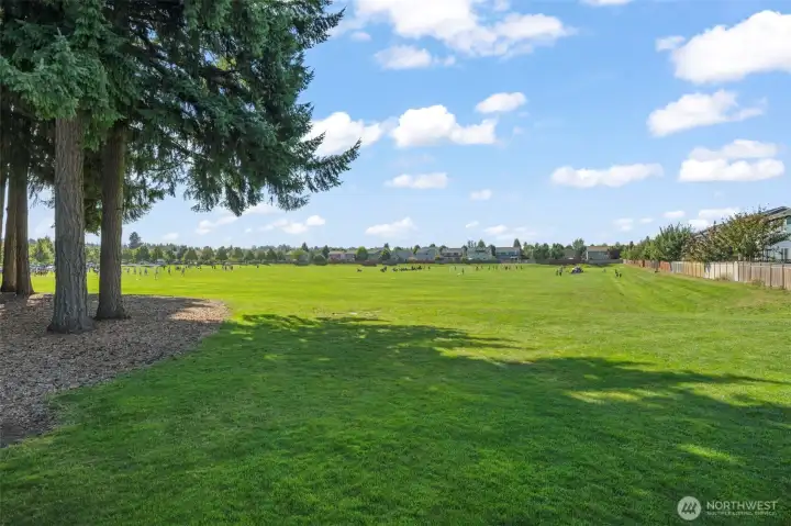 Huge community field, sport courts, playground, and trails are just 2 blocks from the house!