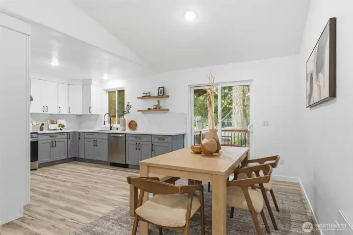 The kitchen is open to the dining area.