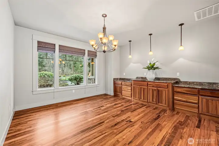 Dedicated Dining Room. Built-in Slab Top Buffet w/ Pendant Lighting!