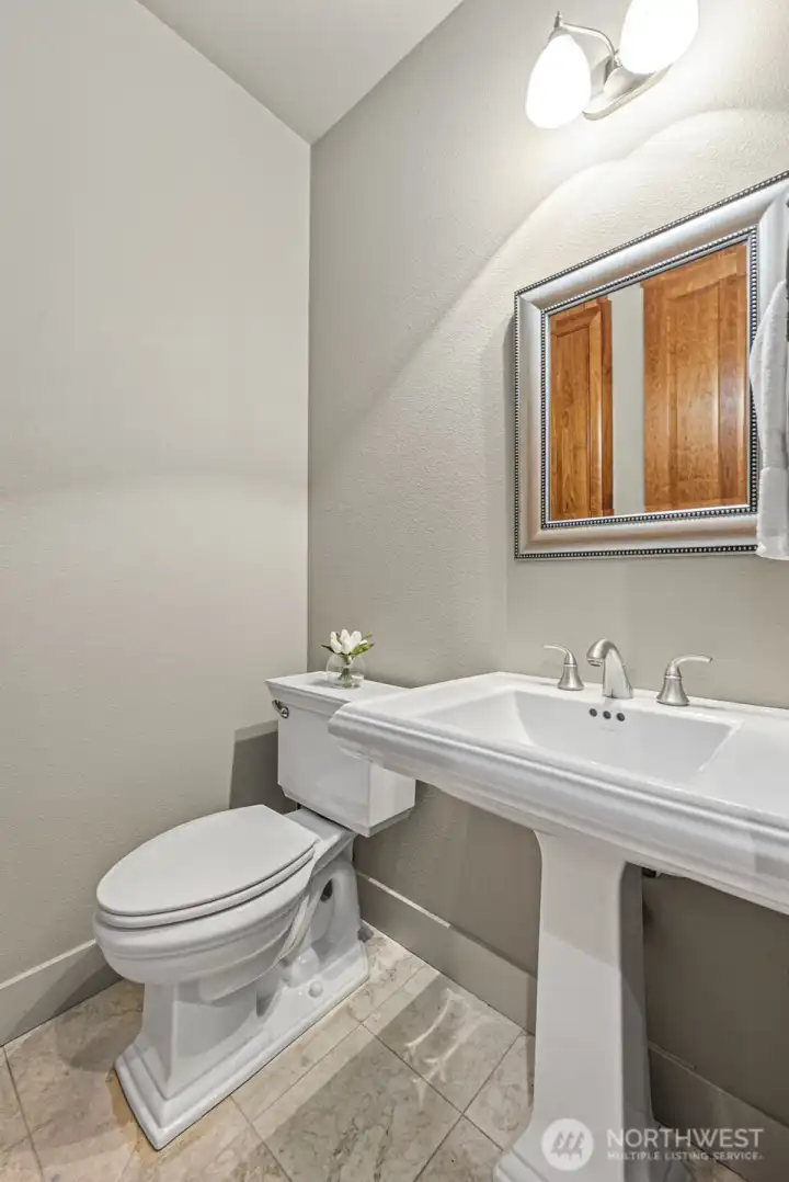 Powder Room with Linen Closet.