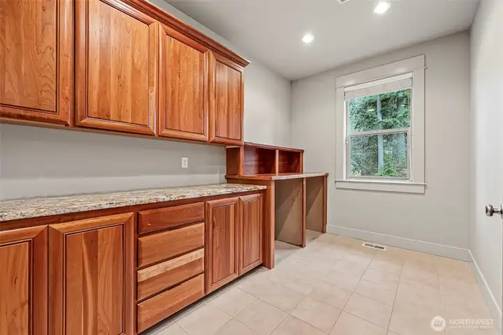 Laundry Room w/ Folding Space & More Cabinetry!