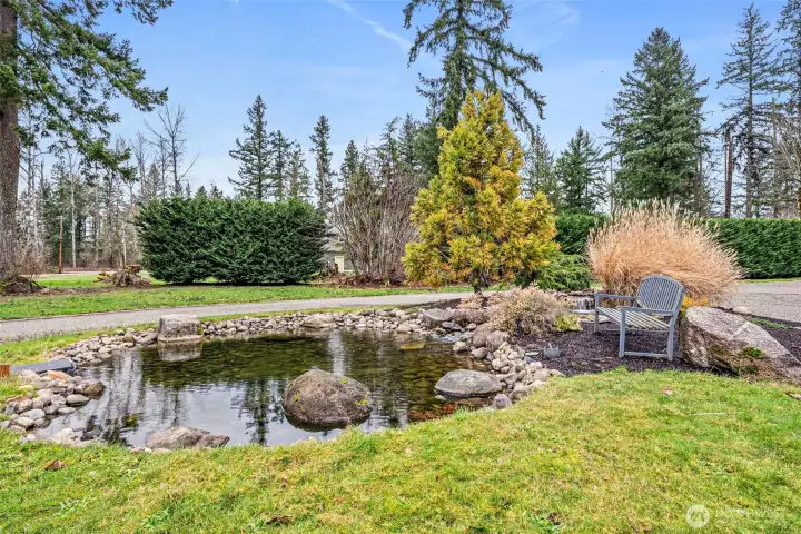 Water Feature with Waterfall Anchors the Circular Drive!