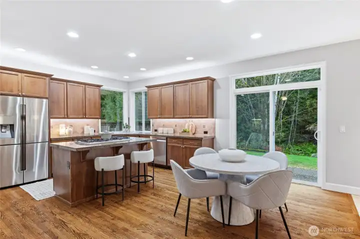 Dining nook with access to the backyard makes alfresco dining easy!
