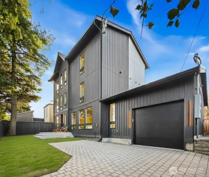 Welcome to 7358 on 33rd Ave NE modern architectural masterpiece featuring soaring ceilings and luxury designer finishes throughout.