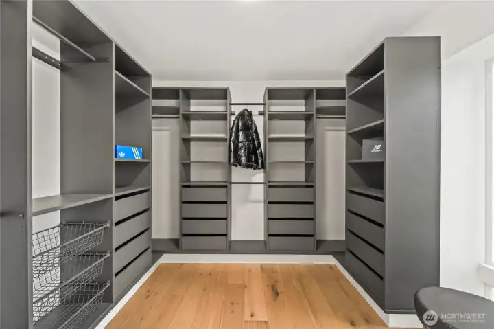 Expansive walk-in closet with a professional-grade organization system.