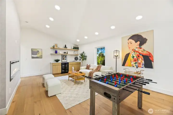 Versatile lower-level media or rec room—the perfect space for games and relaxation.