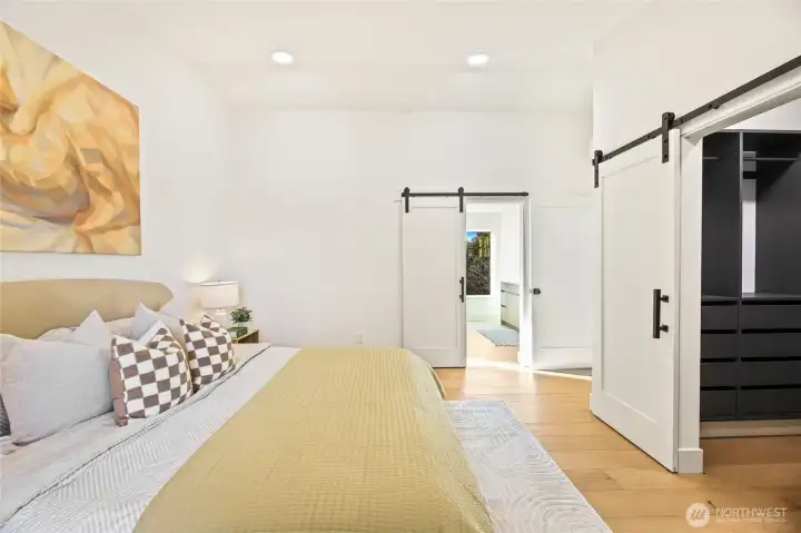 Featuring a sliding barn door and clean, minimalist lines.