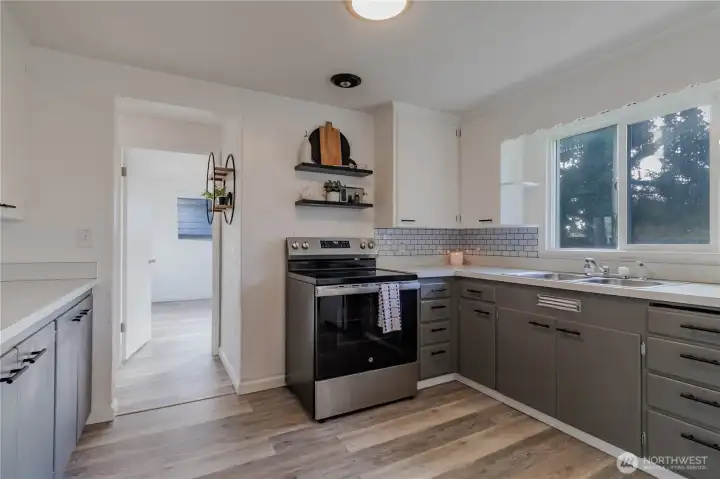 Big kitchen window with a great view of what's going on in the back yard!