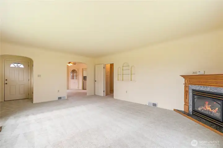 Looking back toward the entry you see the arched passageway to the formal dining room.
