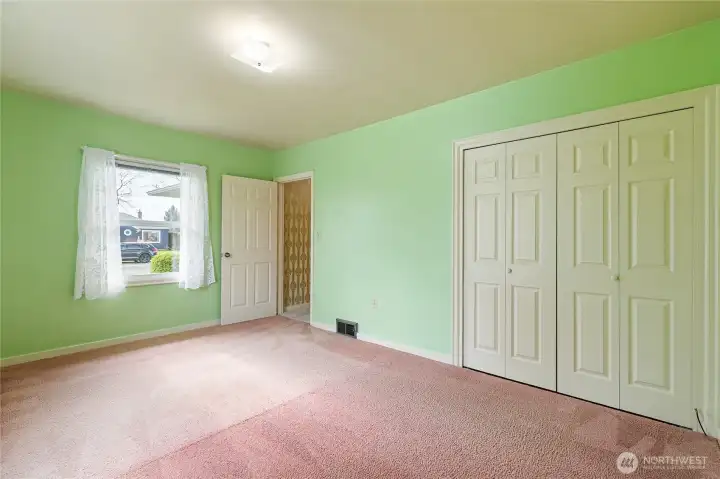 Two windows for light and room enough for your furniture...