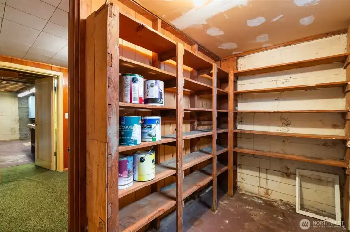 To the right you will find another fixture of the mid-century home...a canning closet, or of course a great storage room.