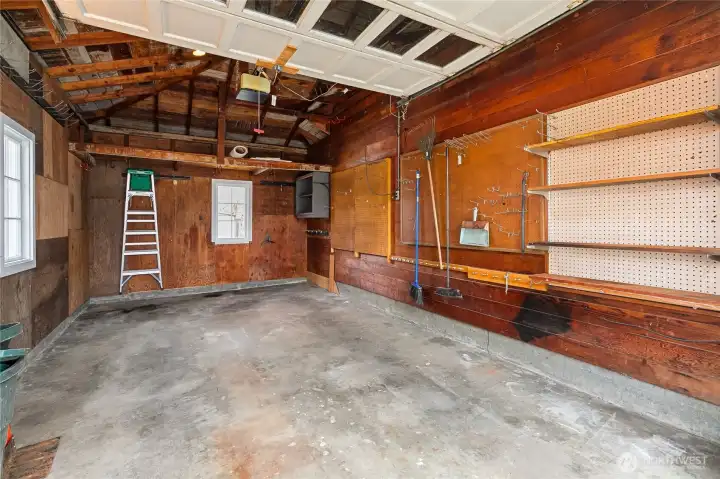 The garage has some storage and plenty of room for most standard autos... Or maybe use your imagination...