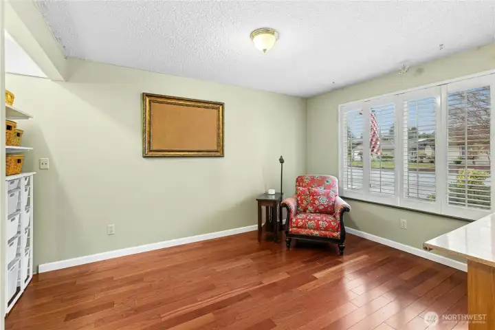 Main floor home office with custom built ins.