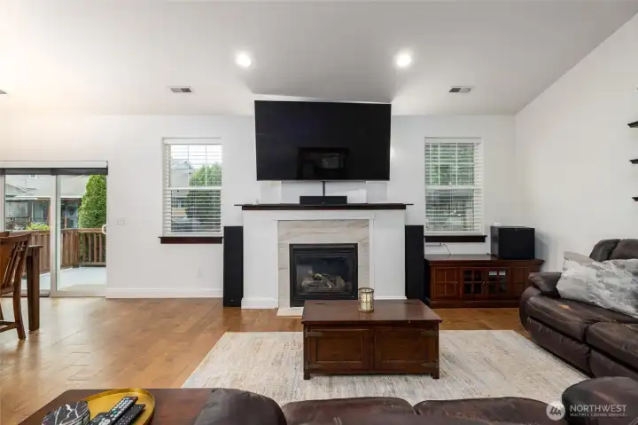 Gas fireplace and vaulted ceilings impress in this space.