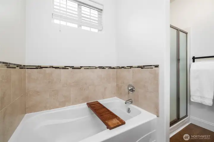 Soaking tub in the primary ensuite bathroom.
